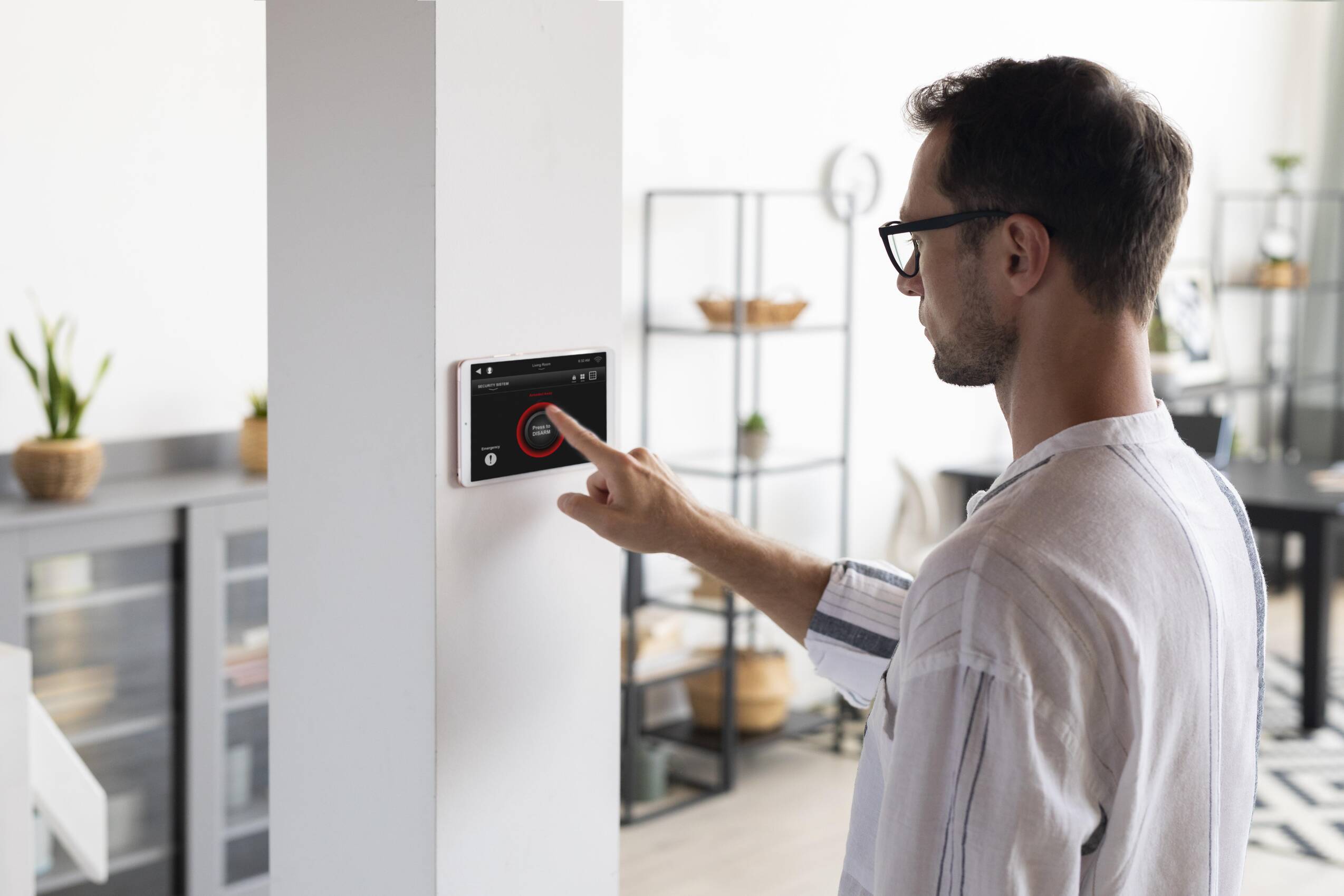 Man using tablet his smart home